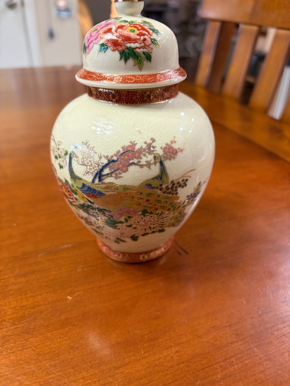 Hand-Painted Cream Porcelain Lidded Vase with Multicolor Peacock Design